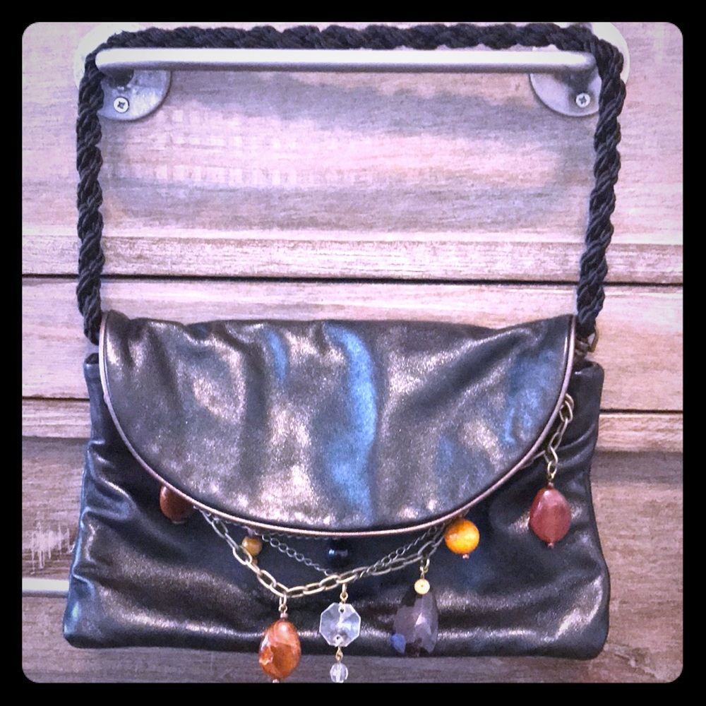 Beautiful leather black statement bag with jewels